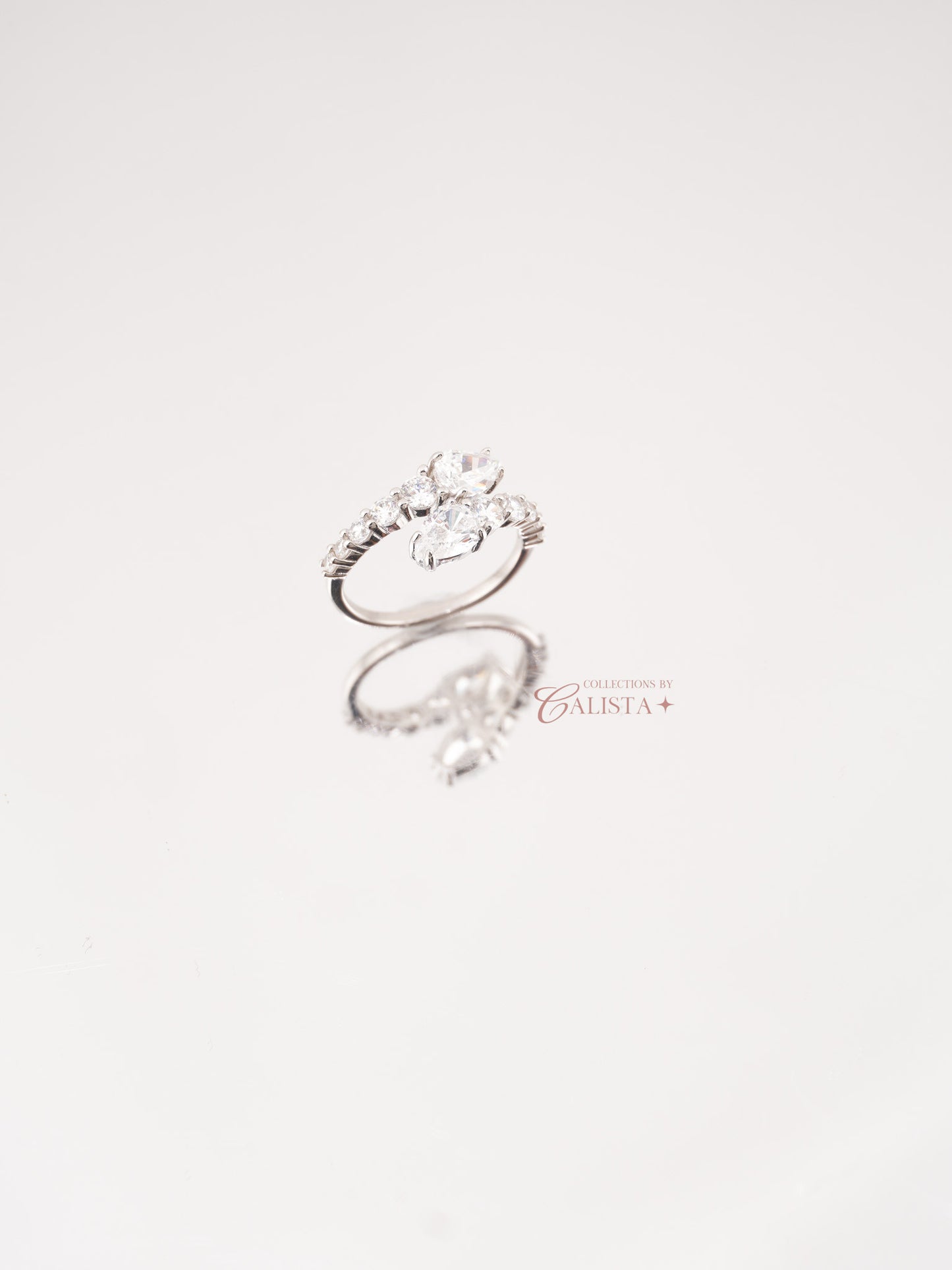 Serpentine Overlap Rhodium-Plated Rings