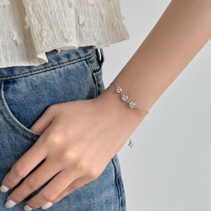 Three-Stone Crystal Round Rhodium-Plated Bracelet