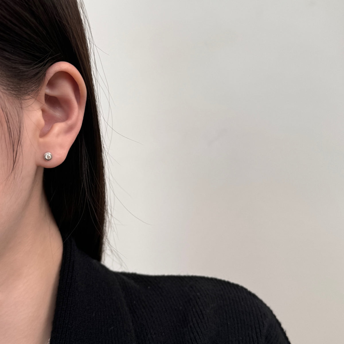 Round Moissanite Rhodium-Plated Stud Earrings