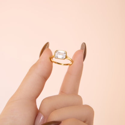 East-West Emerald Bezel Rhodium-Plated Ring