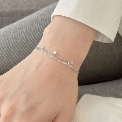 Round Dangling Rhodium-Plated Bracelet